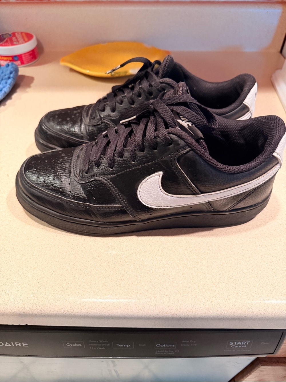 Nike Black Sneakers with White Swoosh Low-Top